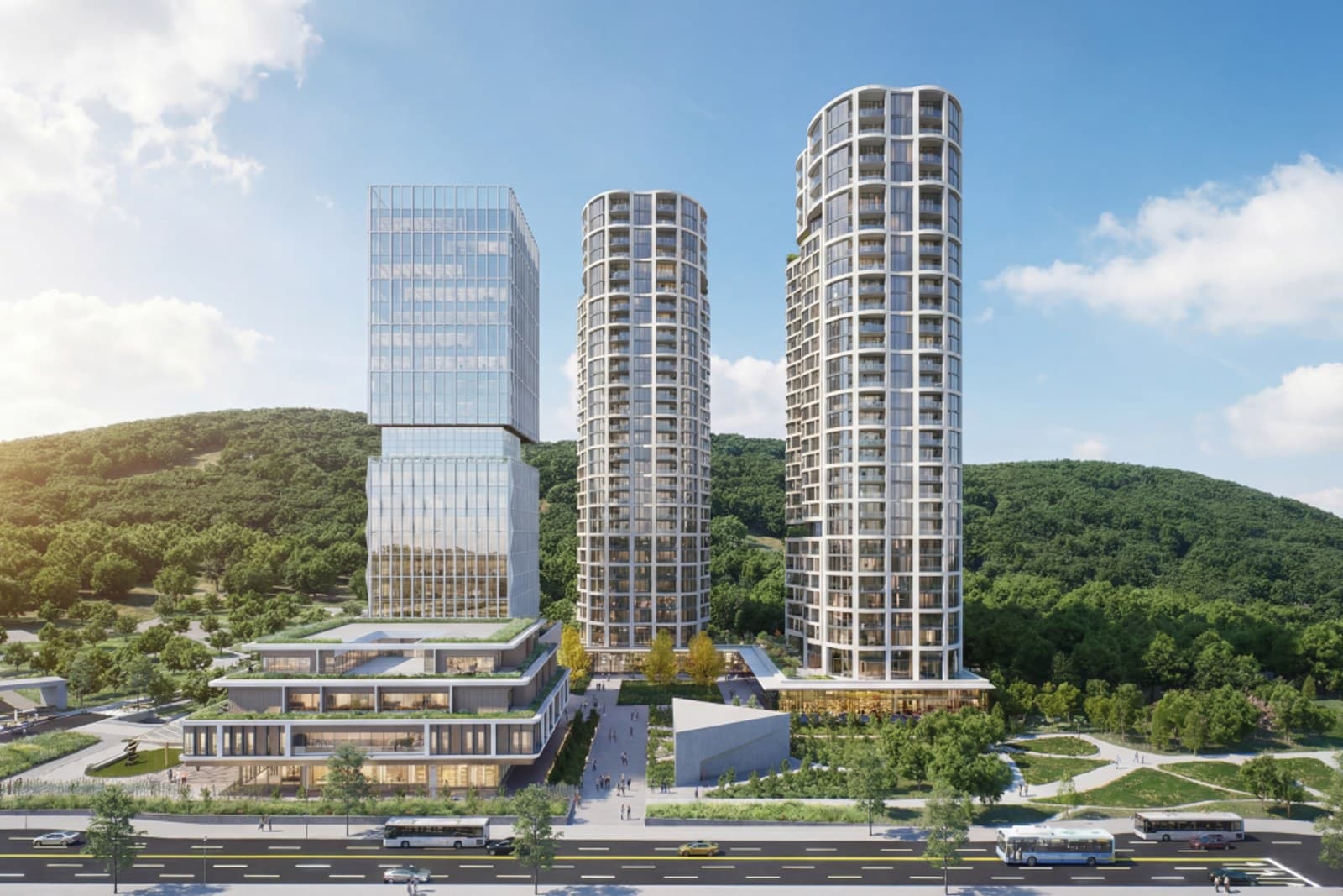 Architectural render of Grace Medical Institute: three towers above a landscaped podium against wooded hills in Pohang